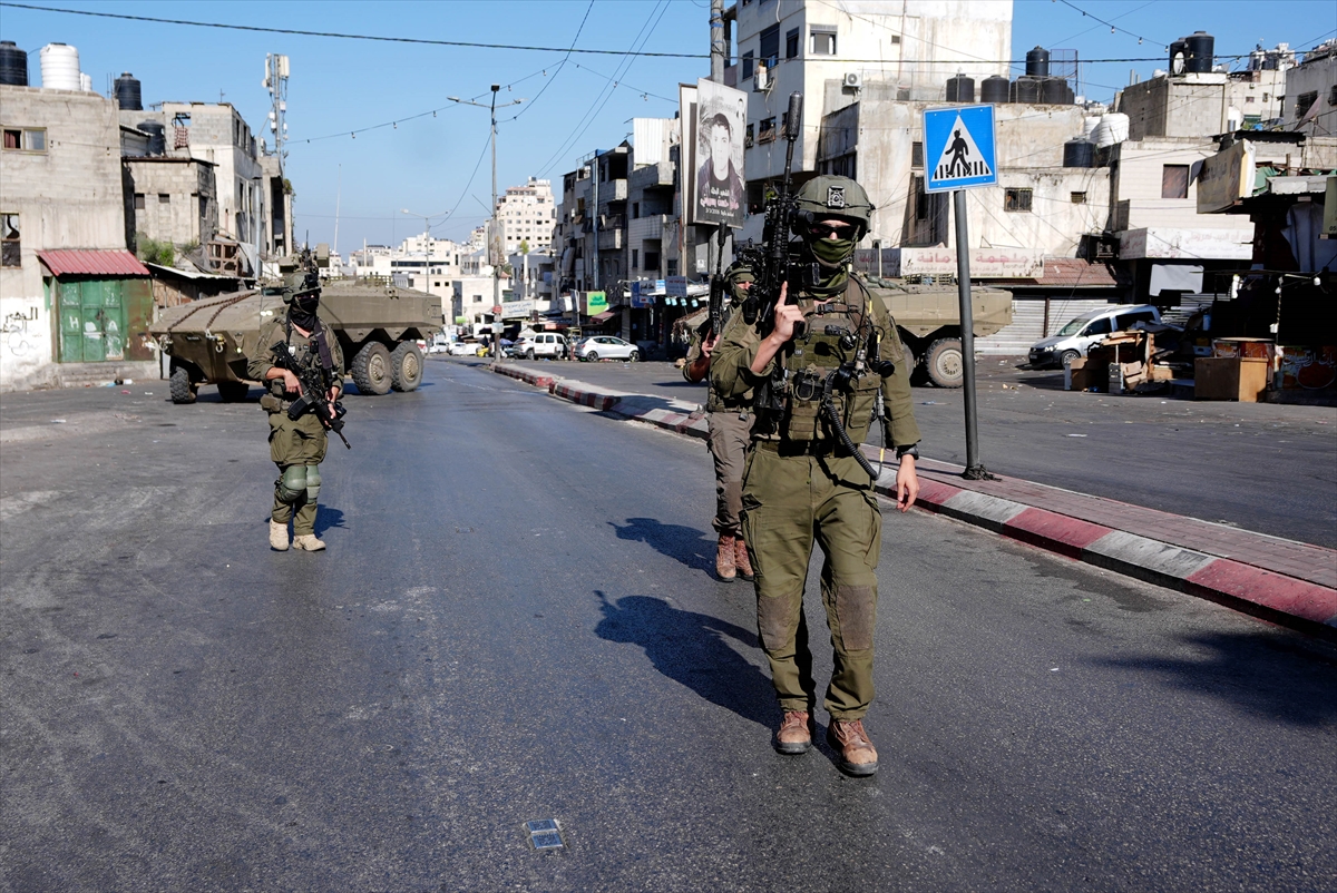 Palestinian woman killed in Gaza as Israeli attacks continue, UN warns of winter shelter shortages, Israel continues bombing Lebanon, men arrested near RAF Fairford in Gloucestershire have been released