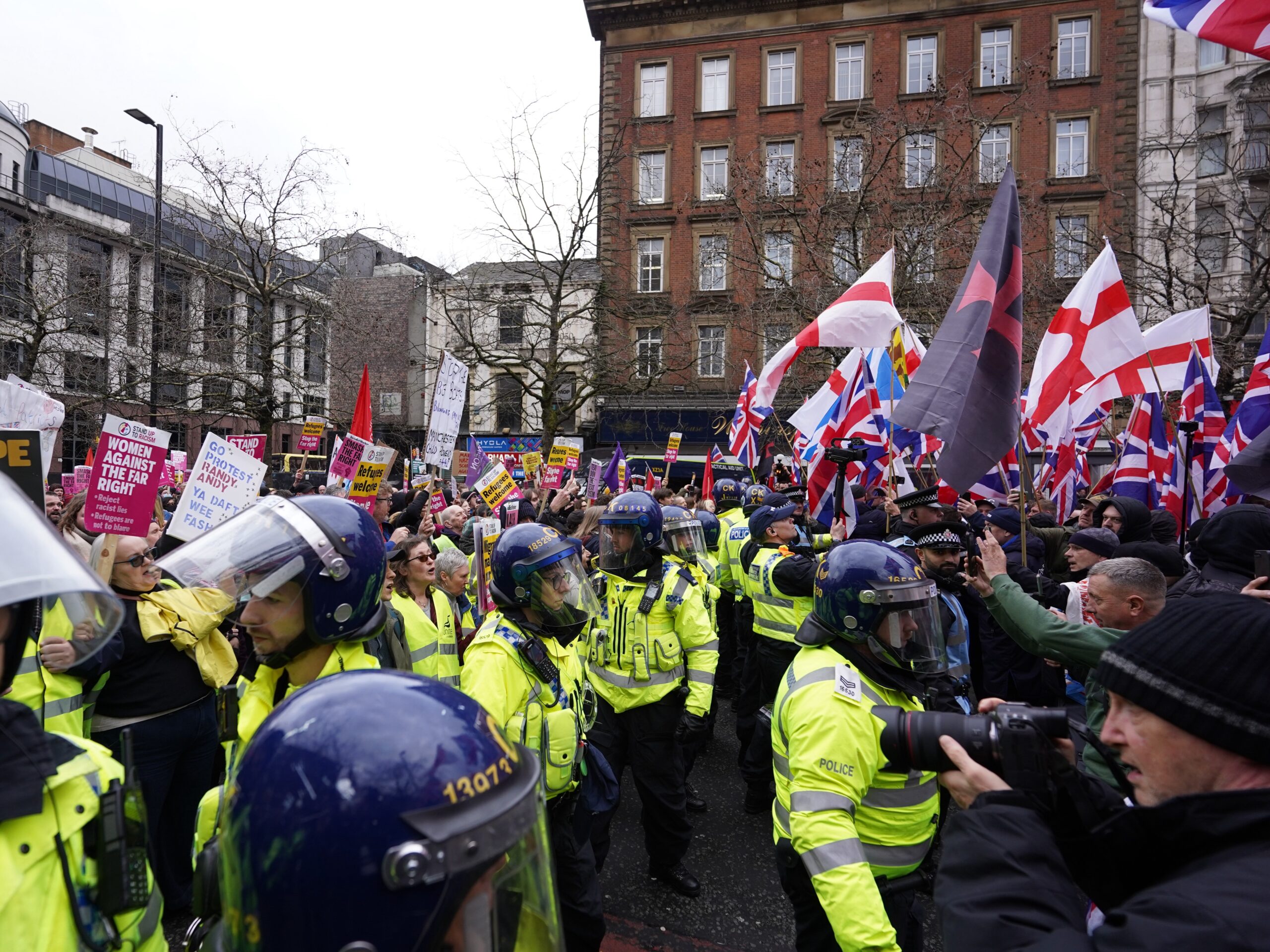 Far-right anti-Islam march met by larger counterprotests in Manchester
