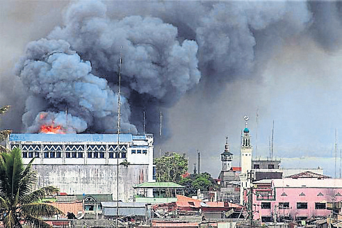 Fighting between military and Daesh-inspired group turn Philippine city into a battle zone