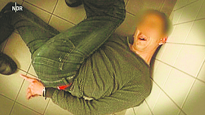 German police officer force-feeds Muslim with rotten pork