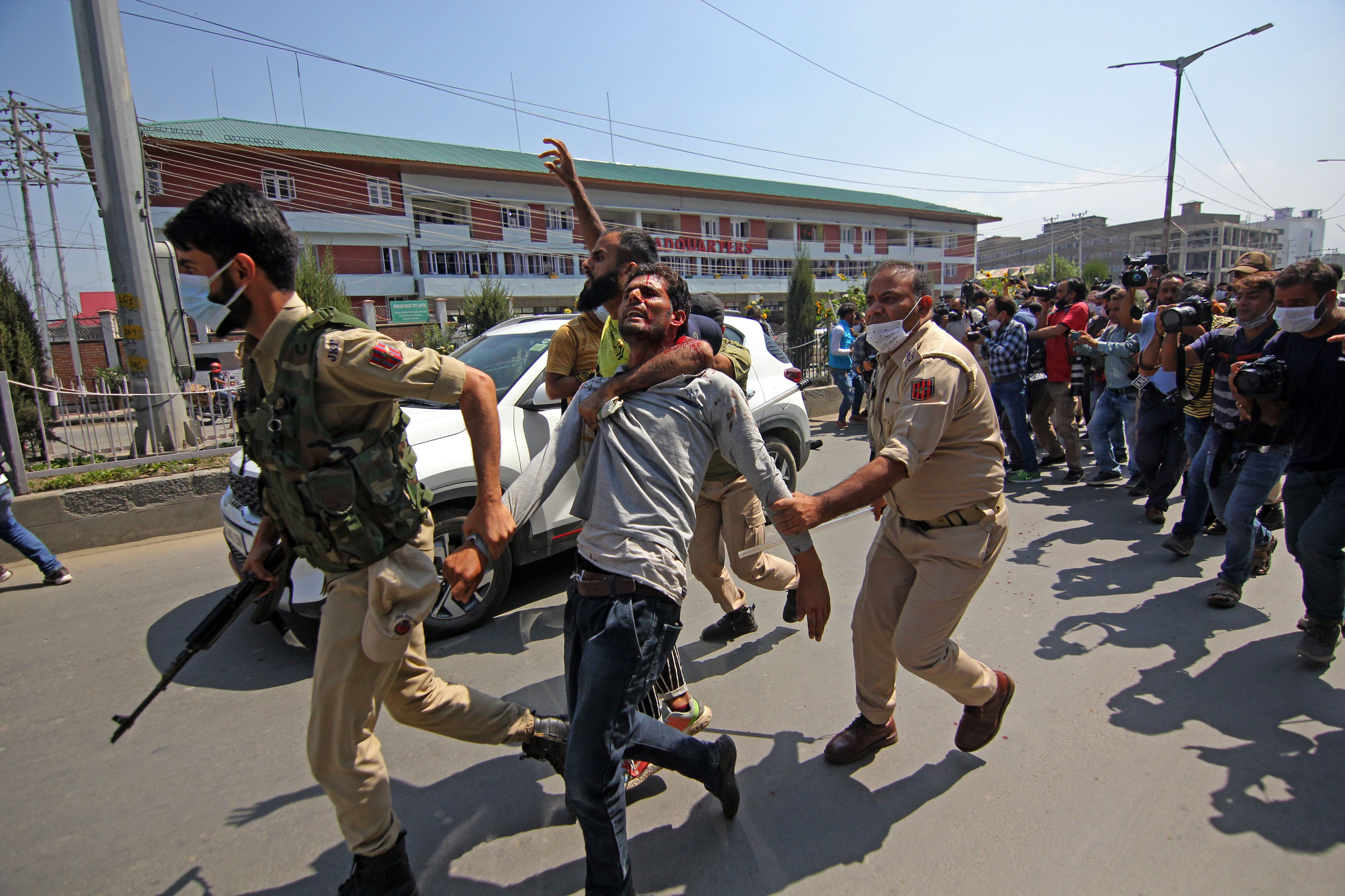 Jammu & Kashmir: Dozens held, journalists beaten as police stop Muslim religious procession