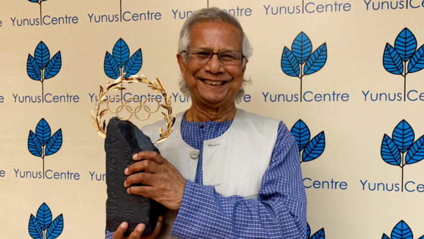 Nobel Laureate Muhammad Yunus awarded Olympic Laurel