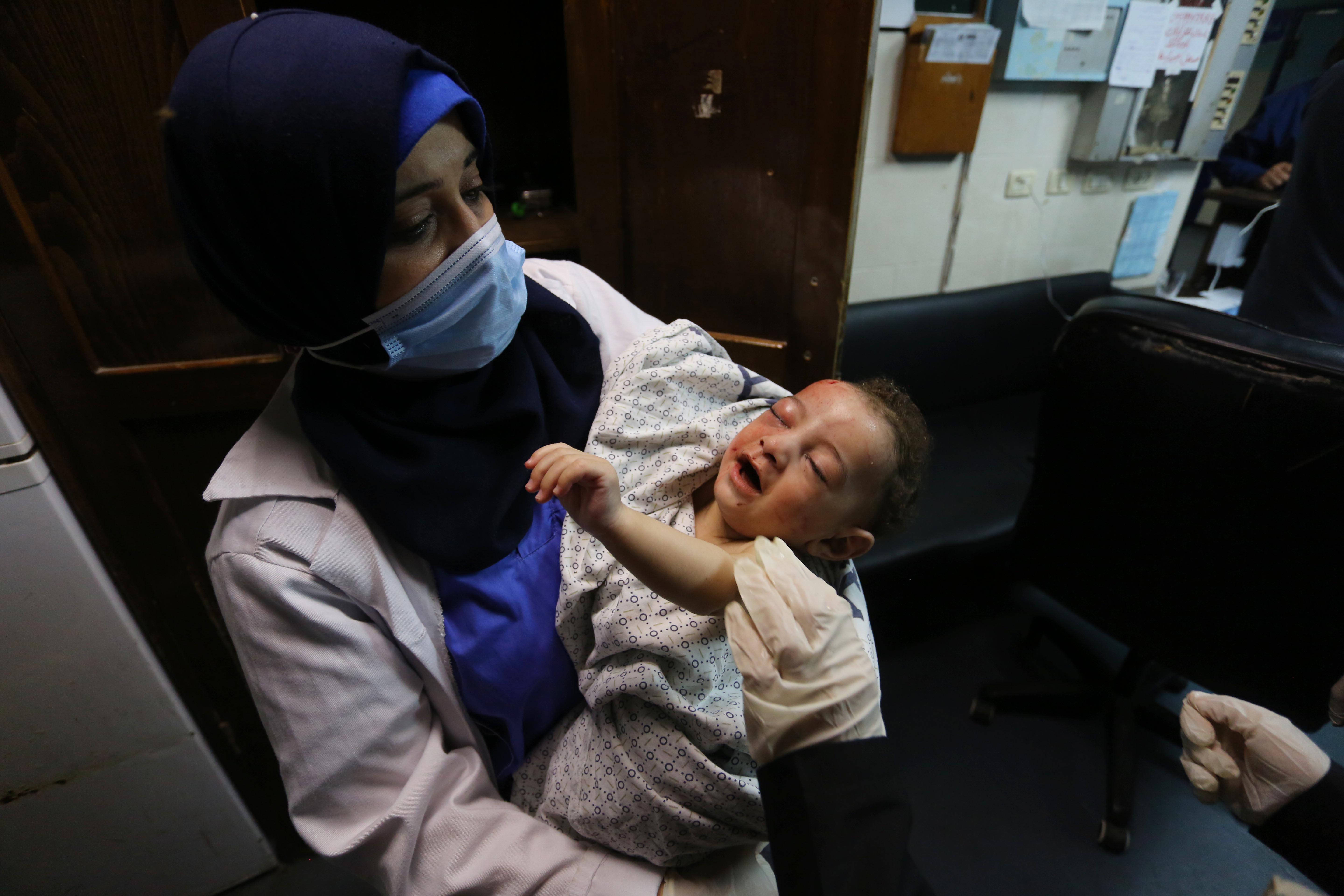 Israeli forces kill 144 [incl 37 children] in attacks on Gaza, 11 in W Bank