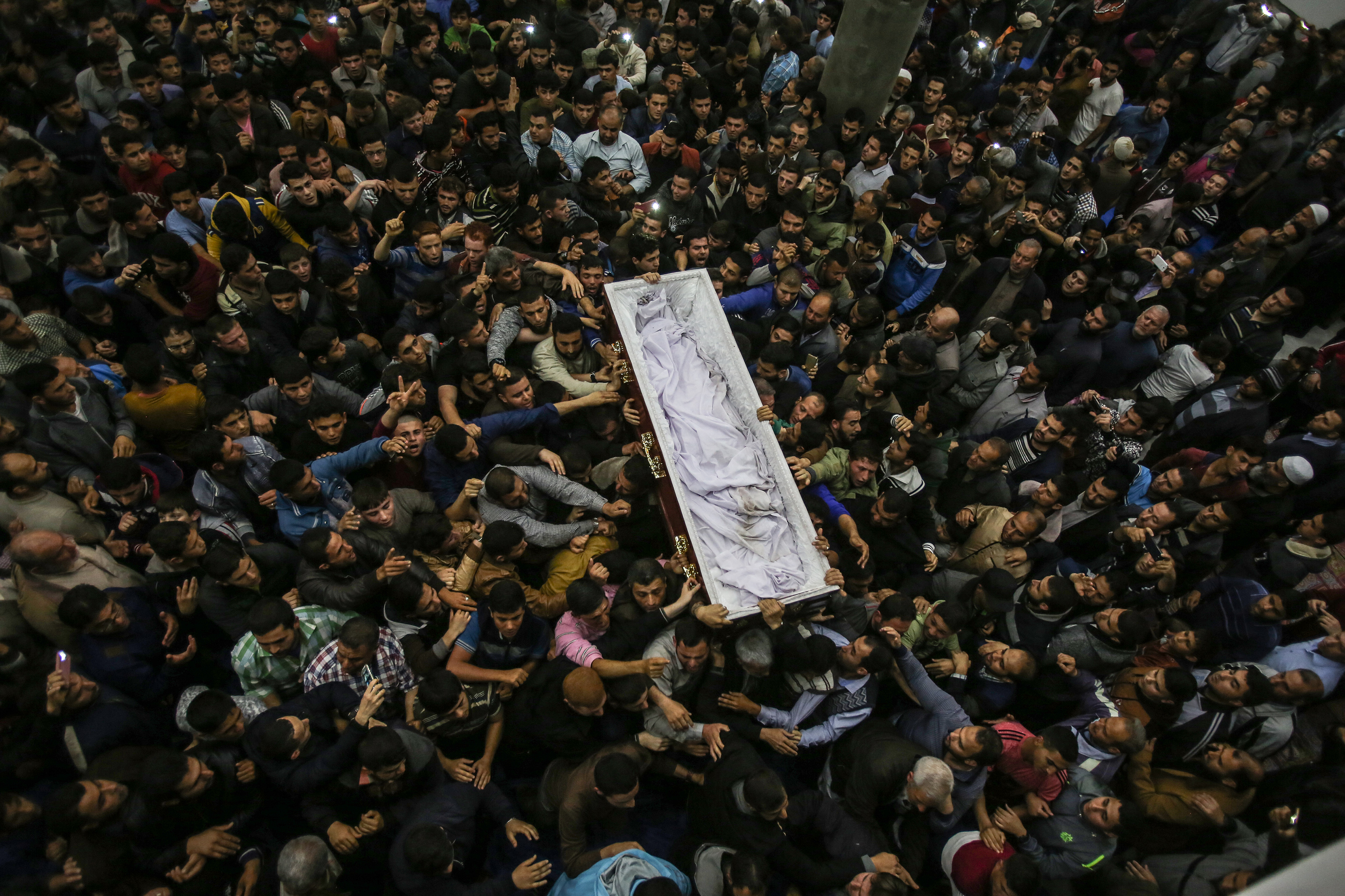 Body of Palestinian assassinated in Malaysia arrives in Gaza, Mossad blamed
