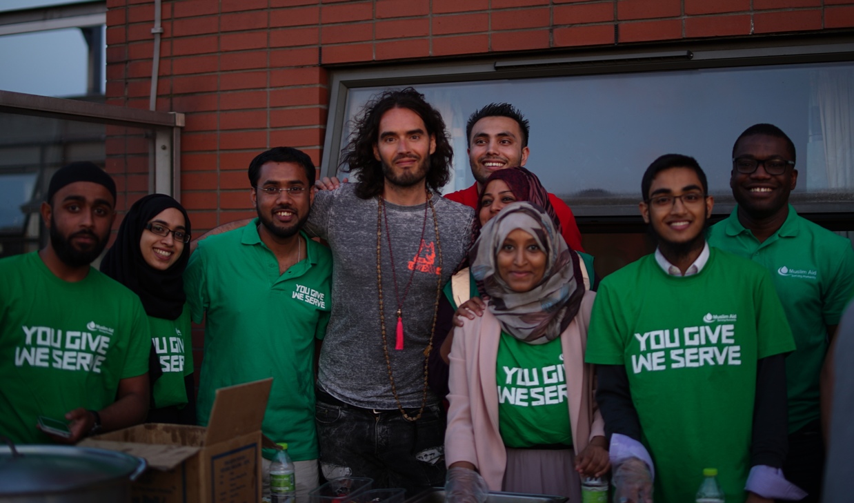 Russell Brand joins to feed the homeless at Booth House