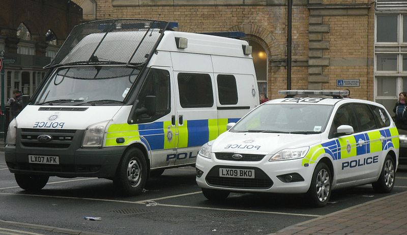 UK: Woman shot, 4 arrested in terror raids