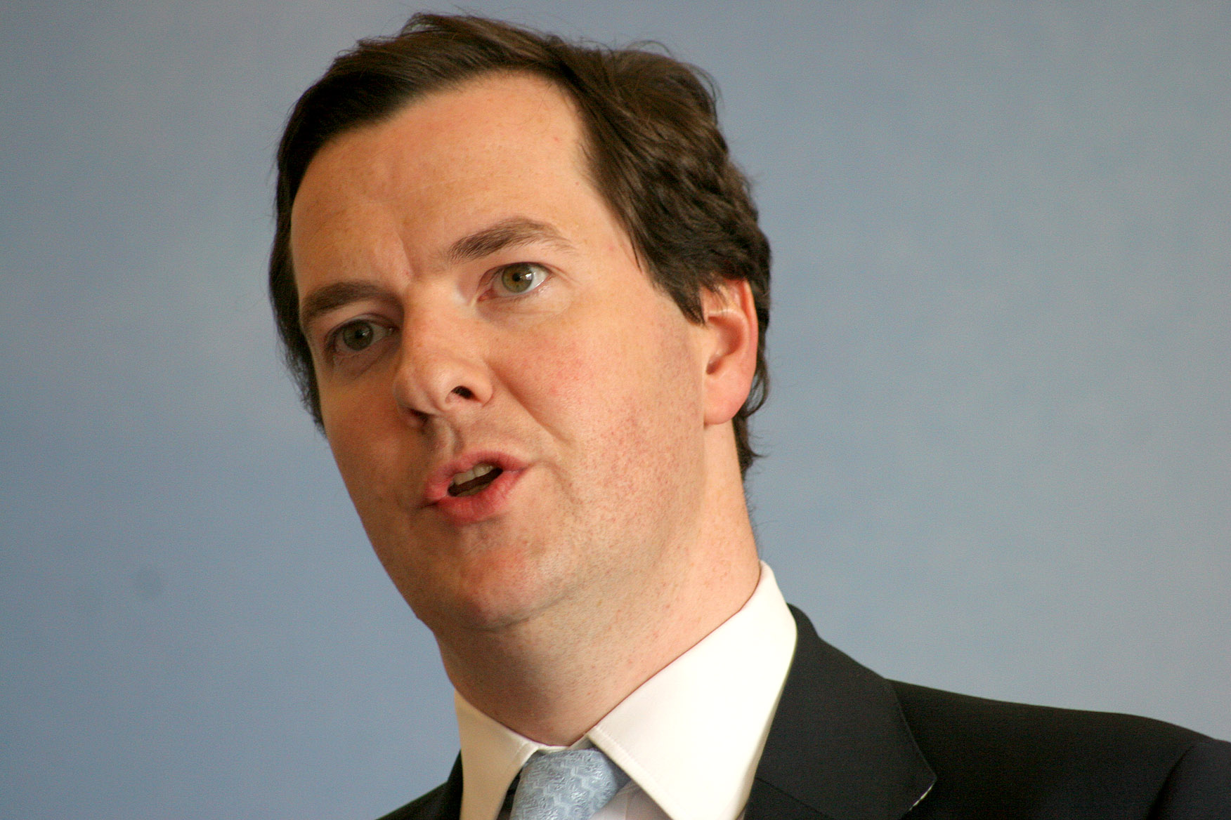 UK reverses welfare, police budget cut plans