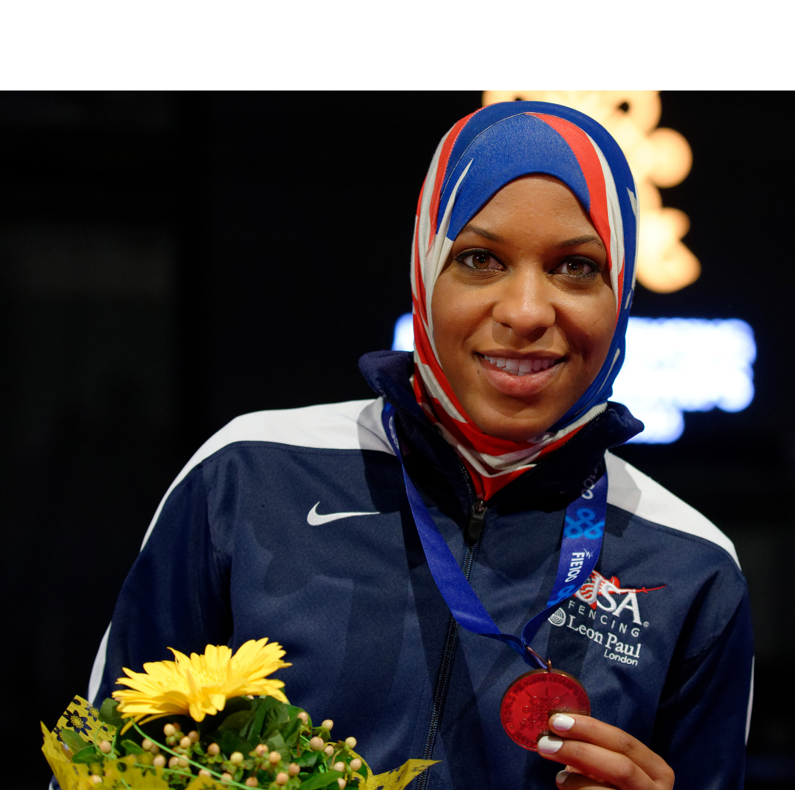 Olympic fencer asked to remove hijab